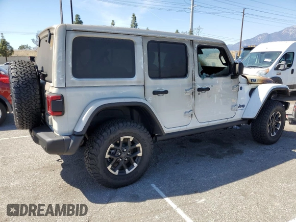 2024 Jeep Wrangler Rubicon X с VIN 1C4RJXR62RW167216, выставлен на аукционе Copart как лот 49034325 с пробегом Не указан миль и Списание • Salvage title. История ставок и продаж доступна на DreamBid. Изображение 3.