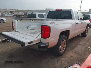 2014 Chevrolet Silverado 1500 LT with VIN 1GCVKREC8EZ108120, listed as a IAAI auction lot 41911695 with 217,358 mi miles. Bid and sale history available at carsss.com. Image 4.
