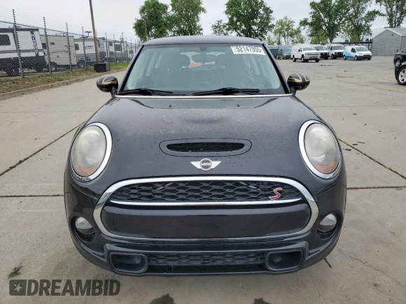 2014 MINI Hardtop S with VIN WMWXM7C57ET987069, listed as a Copart auction lot 52147955 with 121,276 mi miles and Salvage Title. Bid and sale history available at DreamBid. Image 5.
