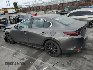 2025 Mazda 3 S Select Sport with VIN JM1BPABM5S1767690, listed as a Copart auction lot 52829045 with 1,093 mi miles and Salvage Title. Bid and sale history available at DreamBid. Image 2.