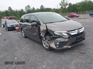 2018 Honda Odyssey EX z VIN 5FNRL6H59JB049346, wystawiony jako IAAI lot #42323764 z przebiegiem 62 192 mil mil oraz . Historia ofert i sprzedaży dostępna na DreamBid. Obrazek 1.