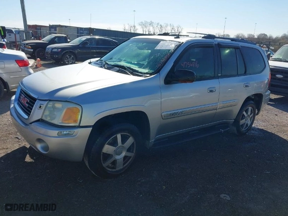 2004 GMC Envoy SLE with VIN 1GKDT13S042337388, listed as a IAAI auction lot 41756816 with 309,789 mi miles. Bid and sale history available at carsss.com. Image 2.