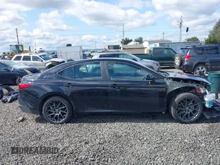 2025 Toyota Camry LE z VIN 4T1DBADK4SU011099, wystawiony jako IAAI lot #41949441 z przebiegiem 1 548 mil mil oraz . Historia ofert i sprzedaży dostępna na DreamBid. Obrazek 14.