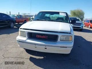 1997 GMC Sonoma SLS with VIN 1GTCS19X2V8528709, listed as a IAAI auction lot 40853983 with 243,171 mi miles and . Bid and sale history available at DreamBid. Image 12.