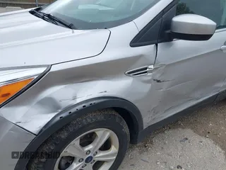 2016 Ford Escape SE with VIN 1FMCU9GX3GUA96262, listed as a IAAI auction lot 41915524 with 64,434 mi miles and . Bid and sale history available at DreamBid. Image 6.