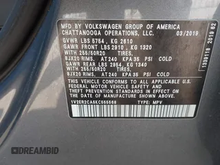2019 Volkswagen Atlas SEL z VIN 1V2ER2CA5KC555568, wystawiony jako IAAI lot #42050516 z przebiegiem 71 599 mil mil oraz . Historia ofert i sprzedaży dostępna na DreamBid. Obrazek 9.