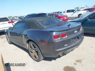 2013 Chevrolet Camaro LT z VIN 2G1FC3D33D9134173, wystawiony jako IAAI lot #41954984 z przebiegiem 157 919 mil mil oraz . Historia ofert i sprzedaży dostępna na DreamBid. Obrazek 3.