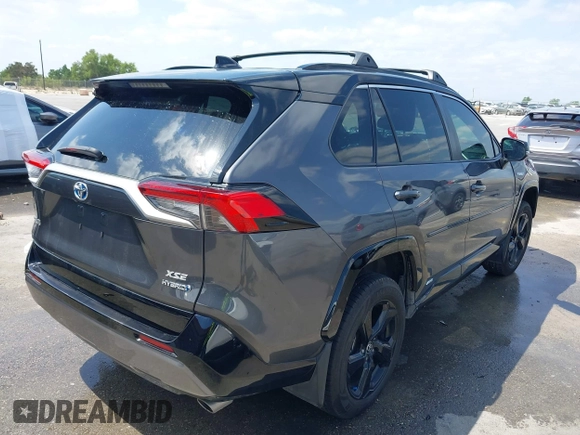 2021 Toyota RAV4 Hybrid XSE with VIN 2T3E6RFV8MW026973, listed as a IAAI auction lot 42052289 with 94,857 mi miles and . Bid and sale history available at DreamBid. Image 4.