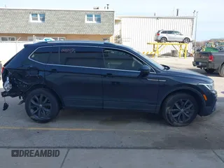 2022 Volkswagen Tiguan SE z VIN 3VV2B7AX4NM118467, wystawiony jako IAAI lot #41769676 z przebiegiem 55 305 mil mil oraz . Historia ofert i sprzedaży dostępna na DreamBid. Obrazek 14.