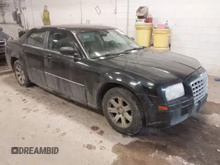 2007 Chrysler 300 with VIN 2C3LA43R17H860639, listed as a IAAI auction lot 41481326 with 163,837 mi miles. Bid and sale history available at carsss.com. Image 1.