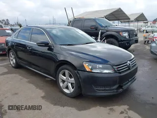 2012 Volkswagen Passat SE with VIN 1VWBP7A31CC047883, listed as a IAAI auction lot 42130138 with 142,017 mi miles. Bid and sale history available at carsss.com. Image 1.