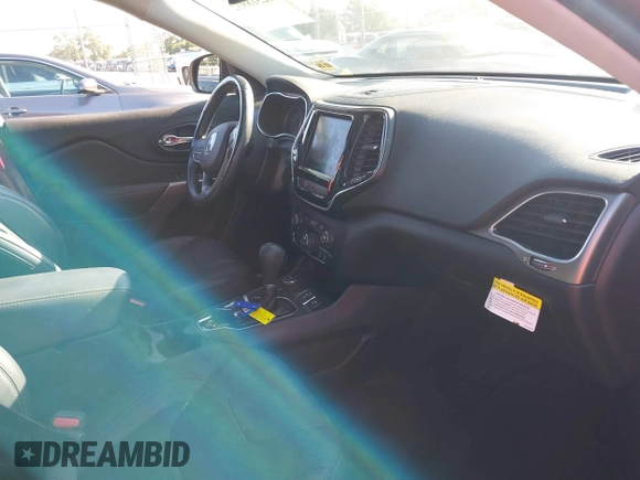 2020 Jeep Cherokee Limited with VIN 1C4PJMDX5LD567098, listed as a IAAI auction lot 42518932 with 46,177 mi miles and . Bid and sale history available at DreamBid. Image 5.