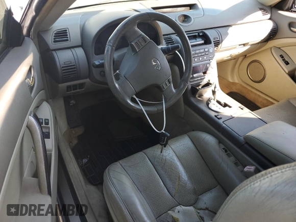 2004 Infiniti G35 Coupe w/Leather with VIN JNKCV54E84M813276, listed as a Copart auction lot 77352694 with 178,479 mi miles and Salvage Title. Bid and sale history available at carsss.com. Image 8.