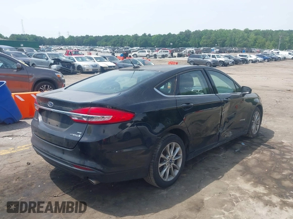 2017 Ford Fusion Hybrid SE with VIN 3FA6P0LU4HR358501, listed as a IAAI auction lot 42287032 with 165,456 mi miles and . Bid and sale history available at DreamBid. Image 4.