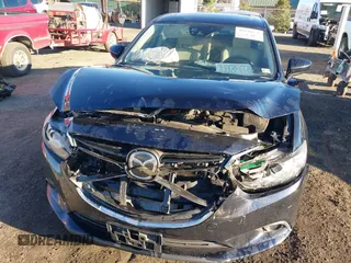 2015 Mazda 6 i Grand Touring with VIN JM1GJ1W55F1183824, listed as a IAAI auction lot 40840126 with 132,773 mi miles. Bid and sale history available at carsss.com. Image 6.