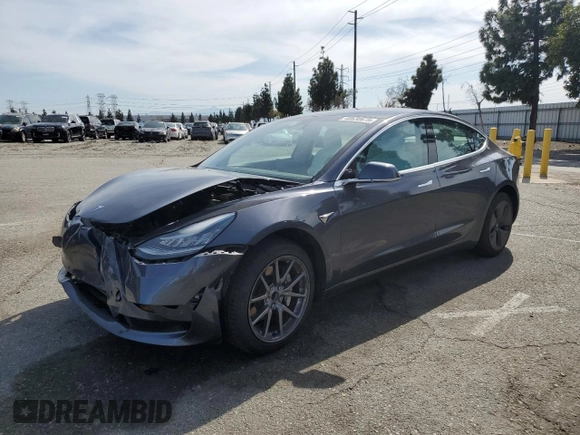 2019 Tesla Model 3 Mid Range with VIN 5YJ3E1EA0KF445185, listed as a Copart auction lot 48630675 with 76,351 mi miles and Salvage Title. Bid and sale history available at carsss.com. Image 1.