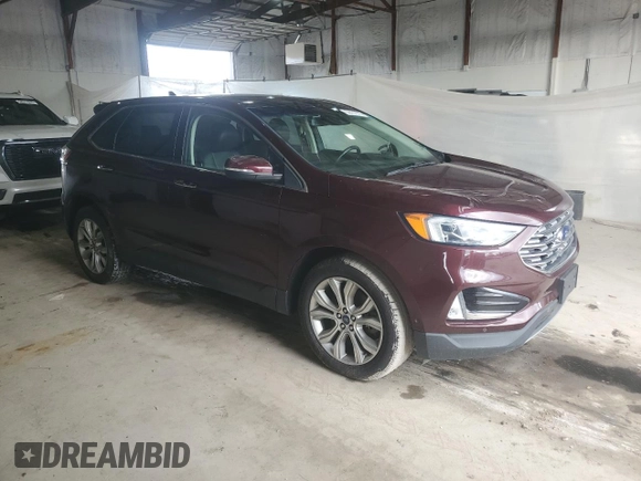 2019 Ford Edge Titanium z VIN 2FMPK4K94KBC11873, wystawiony jako Copart lot #58737735 z przebiegiem 127 278 mil mil oraz Czysty tytuł • Clean title. Historia ofert i sprzedaży dostępna na DreamBid. Obrazek 4.