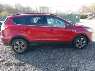 2014 Ford Escape SE with VIN 1FMCU9G90EUD71021, listed as a IAAI auction lot 42052487 with 154,811 mi miles and . Bid and sale history available at DreamBid. Image 14.