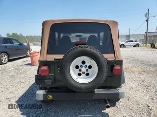 1997 Jeep Wrangler Sahara with VIN 1J4FY49S3VP519387, listed as a Copart auction lot 63822395 with 187,884 mi miles and Salvage title. Bid and sale history available at DreamBid. Image 6.
