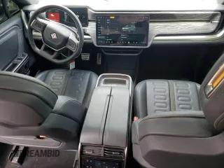 2022 Rivian R1S Launch Edition z VIN 7PDSGABL5NN001018, wystawiony jako Copart lot #56914725 z przebiegiem 26 156 mil mil oraz Szkoda całkowita • Salvage title. Historia ofert i sprzedaży dostępna na DreamBid. Obrazek 8.