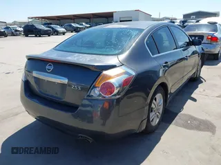 2012 Nissan Altima 2.5 with VIN 1N4AL2AP0CN566515, listed as a IAAI auction lot 41977356 with 294,729 mi miles and . Bid and sale history available at DreamBid. Image 4.
