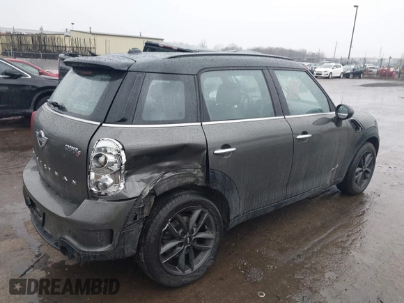 2014 MINI Countryman S z VIN WMWZC5C55EWP38431, wystawiony jako IAAI lot #41710523 z przebiegiem 153 441 mil mil oraz . Historia ofert i sprzedaży dostępna na DreamBid. Obrazek 4.
