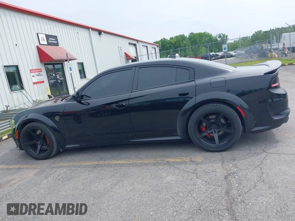 2020 Dodge Charger SRT Hellcat z VIN 2C3CDXL9XLH134202, wystawiony jako IAAI lot #42402856 z przebiegiem 24 675 mil mil oraz . Historia ofert i sprzedaży dostępna na DreamBid. Obrazek 14.
