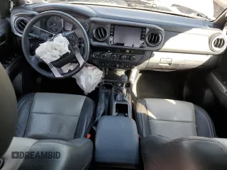 2021 Toyota Tacoma SR with VIN 3TMCZ5AN6MM371211, listed as a Copart auction lot 48366635 with 58,230 mi miles and Salvage title. Bid and sale history available at DreamBid. Image 8.