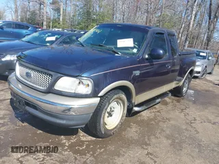 1999 Ford F-150 XL with VIN 2FTRX07L3XCA60067, listed as a IAAI auction lot 41887212 with 176,034 mi miles. Bid and sale history available at carsss.com. Image 2.