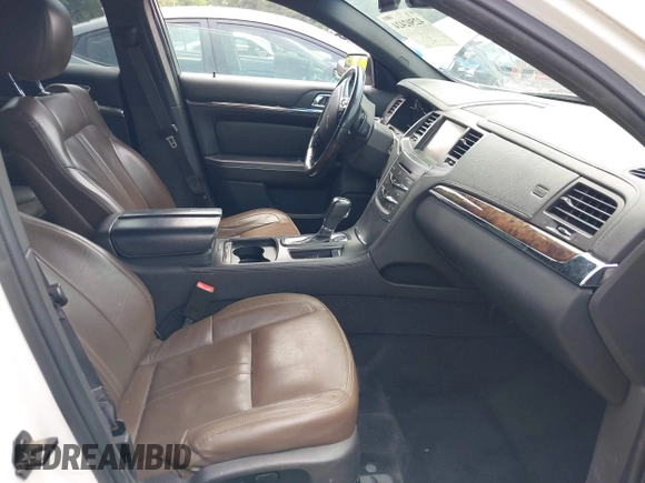 2013 Lincoln MKS with VIN 1LNHL9DK6DG600928, listed as a IAAI auction lot 42502424 with 194,015 mi miles and . Bid and sale history available at DreamBid. Image 5.