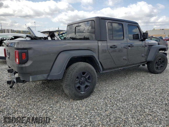2023 Jeep Gladiator Freedom with VIN 1C6JJTAG9PL557861, listed as a Copart auction lot 50452955 with 44,716 mi miles and Salvage title. Bid and sale history available at DreamBid. Image 3.