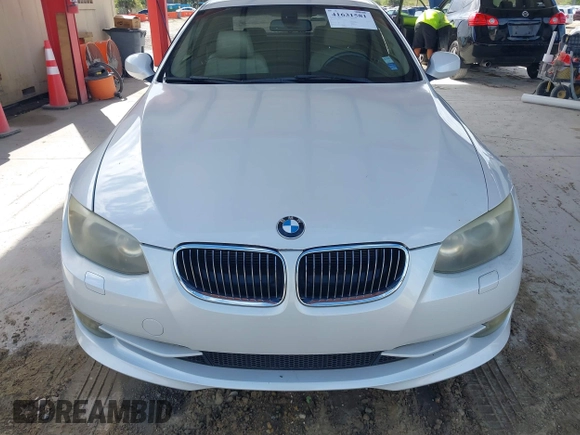 2011 BMW 3 Series 328i with VIN WBAKE3C53BE557457, listed as a IAAI auction lot 41631581 with 112,272 mi miles and . Bid and sale history available at carsss.com. Image 6.