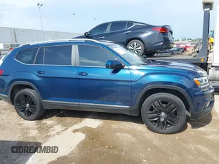2018 Volkswagen Atlas SEL z VIN 1V2MR2CA4JC512804, wystawiony jako IAAI lot #42528402 z przebiegiem 59 226 mil mil oraz . Historia ofert i sprzedaży dostępna na DreamBid. Obrazek 13.