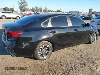 2023 Kia Forte LXS with VIN 3KPF24AD7PE680915, listed as a IAAI auction lot 40741003 with 16,770 mi miles and . Bid and sale history available at DreamBid. Image 4.