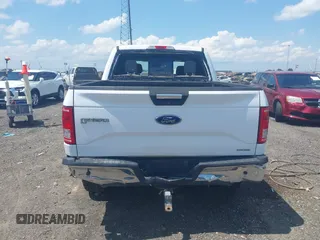 2015 Ford F-150 XLT with VIN 1FTEW1EFXFKD32631, listed as a IAAI auction lot 42454554 with 162,104 mi miles and . Bid and sale history available at DreamBid. Image 16.