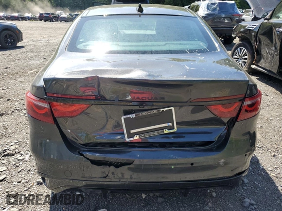 2024 Jaguar XF with VIN SAJB64FXXRCY94427, listed as a Copart auction lot 57876855 with 5,885 mi miles and Salvage title. Bid and sale history available at DreamBid. Image 6.