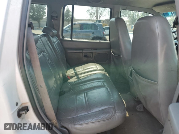 1999 Ford Explorer XLT с VIN 1FMZU32P8XZA65400, выставлен на аукционе Copart как лот 64863835 с пробегом 189 882 миль миль и Списание • Salvage title. История ставок и продаж доступна на DreamBid. Изображение 11.