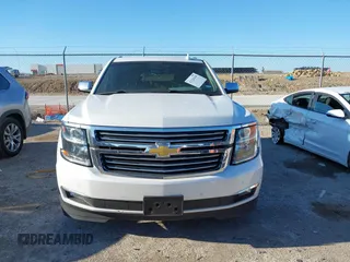 2016 Chevrolet Tahoe LTZ with VIN 1GNSKCKC0GR203348, listed as a IAAI auction lot 42220438 with 108,657 mi miles and . Bid and sale history available at DreamBid. Image 12.