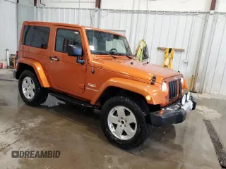 2011 Jeep Wrangler Sahara with VIN 1J4GA5D1XBL557392, listed as a Copart auction lot 56892835 with 109,567 mi miles and Clean title. Bid and sale history available at DreamBid. Image 4.