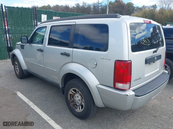 2011 Dodge Nitro SE with VIN 1D4PU2GKXBW508467, listed as a IAAI auction lot 42061484 with 100,295 mi miles. Bid and sale history available at carsss.com. Image 3.