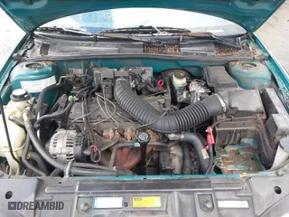 1996 Chevrolet Cavalier with VIN 1G1JC1244TM114865, listed as a IAAI auction lot 41713047 with 189,817 mi miles. Bid and sale history available at carsss.com. Image 10.