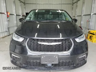 2023 Chrysler Pacifica Hybrid Touring L with VIN 2C4RC1L74PR575358, listed as a Copart auction lot 43261875 with 35,077 mi miles and Clean Title. Bid and sale history available at carsss.com. Image 5.