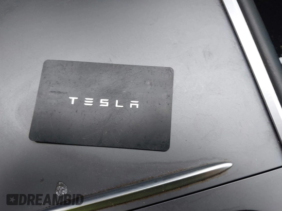 2021 Tesla Model 3 Long Range with VIN 5YJ3E1EB4MF012822, listed as a IAAI auction lot 41918721 with 69,105 mi miles. Bid and sale history available at carsss.com. Image 11.