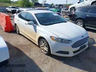2015 Ford Fusion SE z VIN 3FA6P0H7XFR200759, wystawiony jako IAAI lot #42112951 z przebiegiem 233 652 mil mil oraz . Historia ofert i sprzedaży dostępna na DreamBid. Obrazek 1.