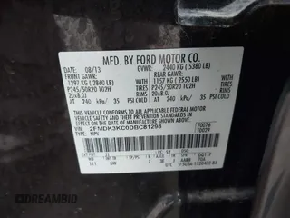 2013 Ford Edge Limited z VIN 2FMDK3KC0DBC81298, wystawiony jako IAAI lot #41911023 z przebiegiem 107 907 mil mil oraz . Historia ofert i sprzedaży dostępna na DreamBid. Obrazek 9.