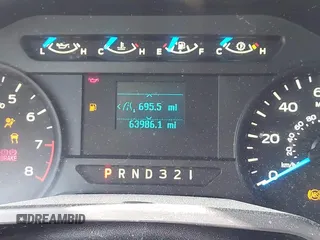 2015 Ford F-150 XL with VIN 1FTMF1C82FKD85016, listed as a IAAI auction lot 42019197 with 63,986 mi miles and . Bid and sale history available at DreamBid. Image 15.