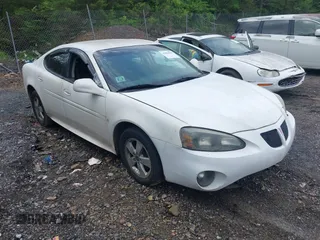 2006 Pontiac Grand Prix with VIN 2G2WP552261230234, listed as a IAAI auction lot 42084562 with 147,639 mi miles. Bid and sale history available at carsss.com. Image 1.