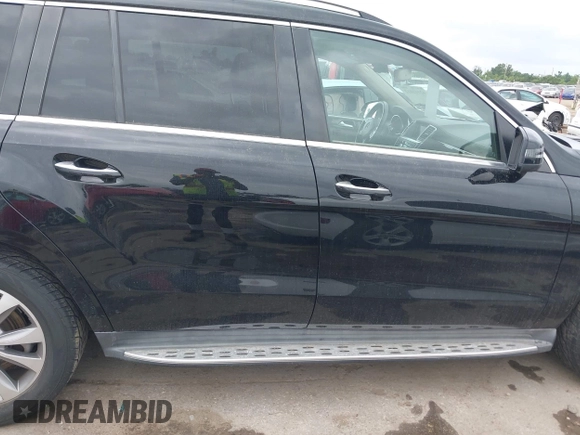 2014 Mercedes-Benz GL 450 with VIN 4JGDF7CE0EA372225, listed as a IAAI auction lot 42141012 with 158,045 mi miles and . Bid and sale history available at DreamBid. Image 13.