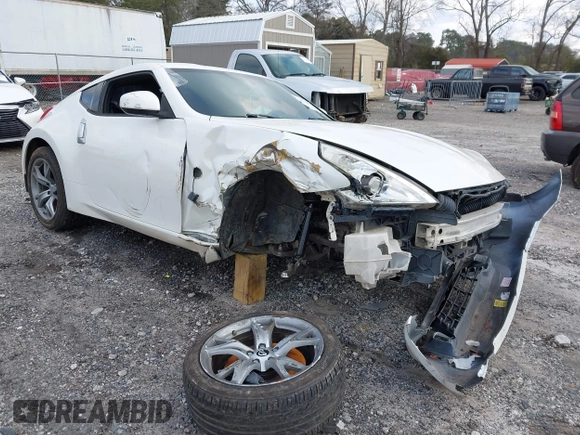 2012 Nissan 370Z Touring with VIN JN1AZ4EH4CM565125, listed as a IAAI auction lot 41630602 with 121,823 mi miles. Bid and sale history available at carsss.com. Image 1.