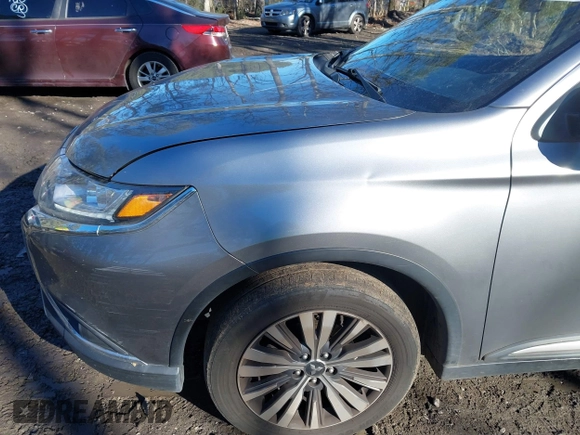 2020 Mitsubishi Outlander ES with VIN JA4AZ3A31LZ041204, listed as a IAAI auction lot 41265645 with 98,372 mi miles and . Bid and sale history available at DreamBid. Image 12.